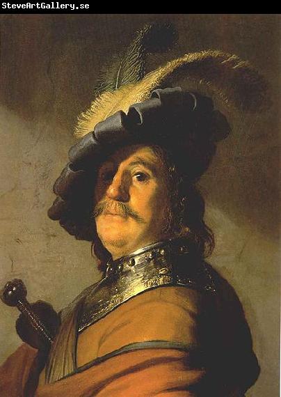 Rembrandt van rijn Bust of a man in a gorget and a feathered beret.